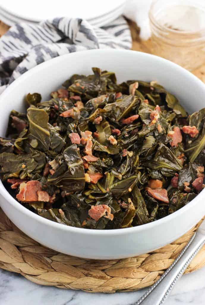 Southern style greens with bacon pieces in a bowl