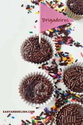 brigadeiro candies on a table with a little flag on top