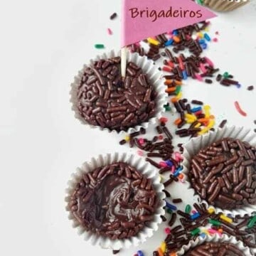 brigadeiro candies on a table with a little flag on top