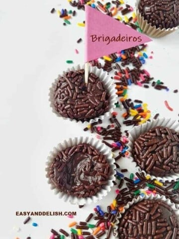 brigadeiro candies on a table with a little flag on top
