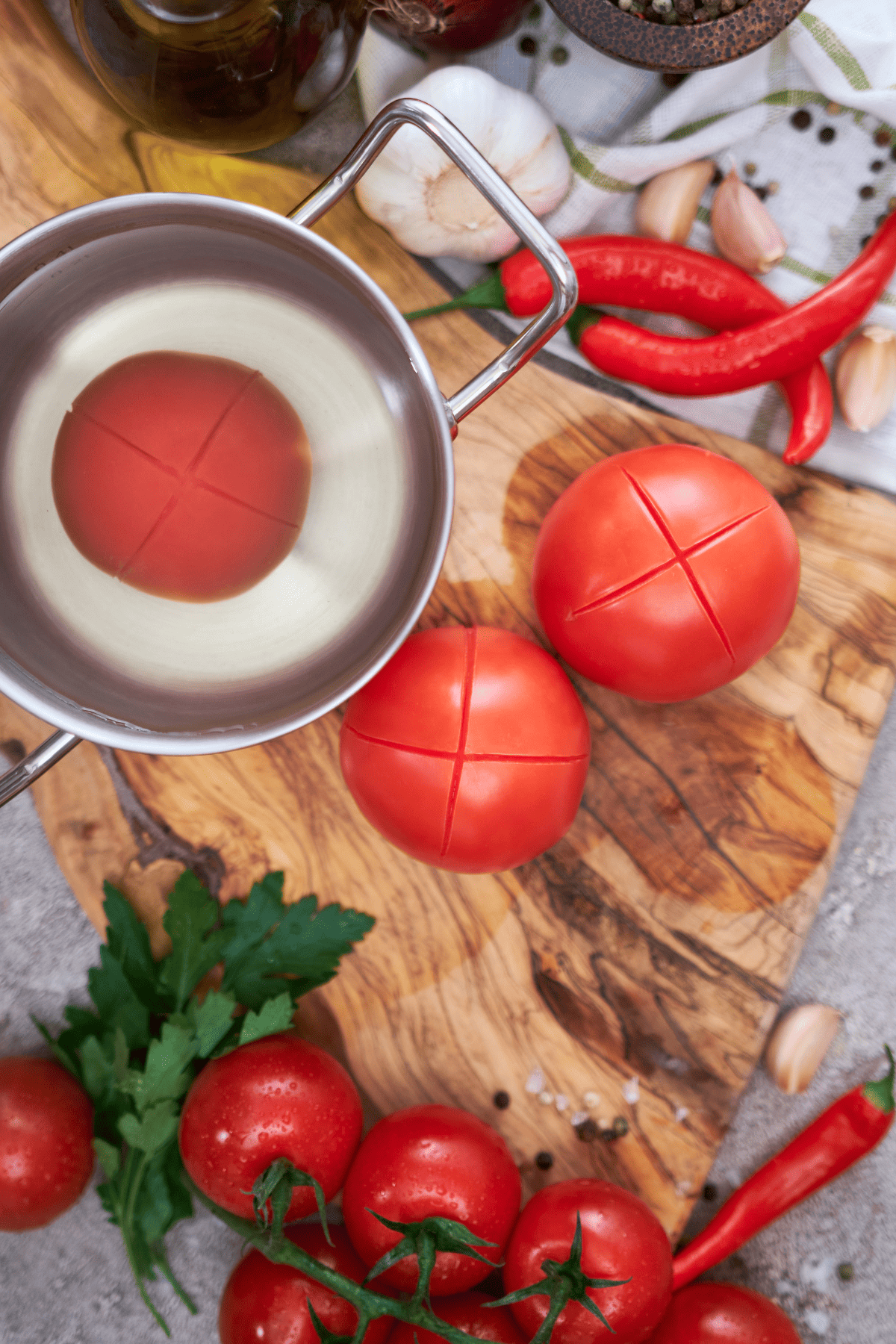 blanched tomatoes on a table.