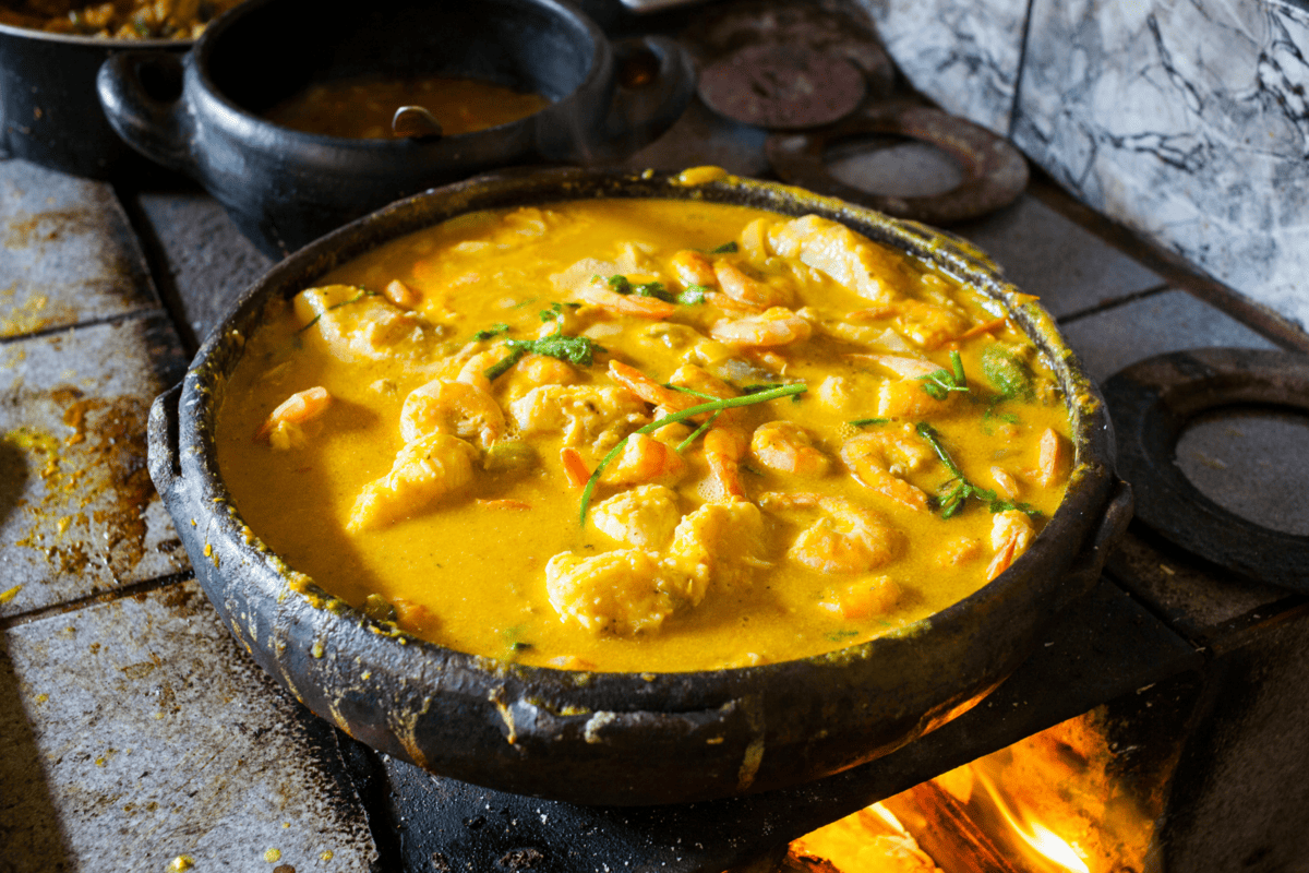 a pan with shrimp soup.