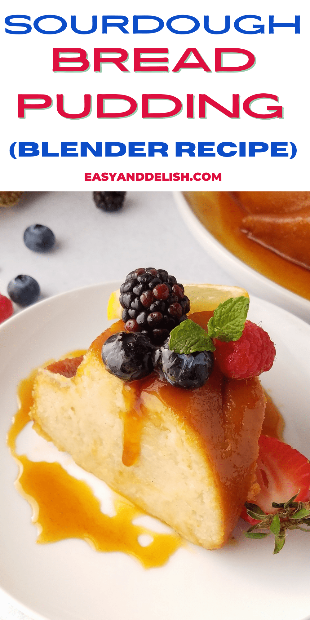 close up of a slice of sourdough bread pudding garnished on top with fruits and caramel.