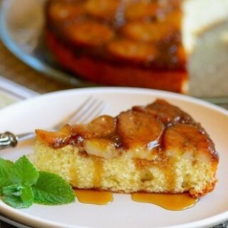 A plate of banana cake with caramel sauce