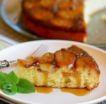 A plate of banana cake with caramel sauce