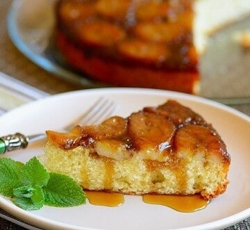 A plate of banana cake with caramel sauce