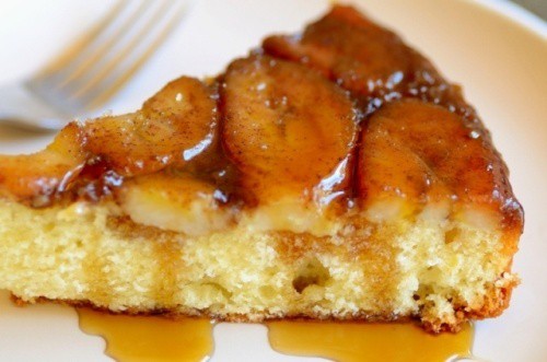 close up image of a slice of Spiced Banana Upside Down Cake served in a plate