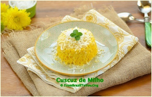 Cornmeal couscous or cuscuz de milho on a white plate