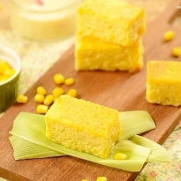 squares of yellow corn cake on a board