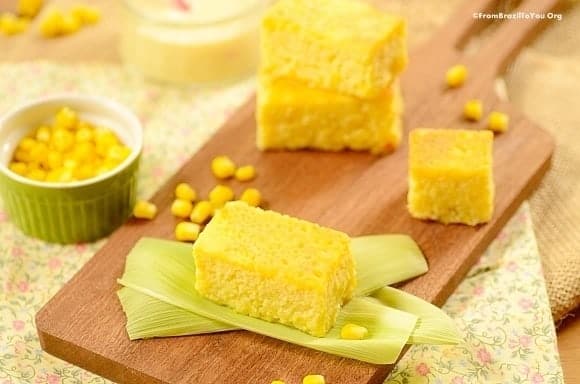 squares of yellow corn cake on a board