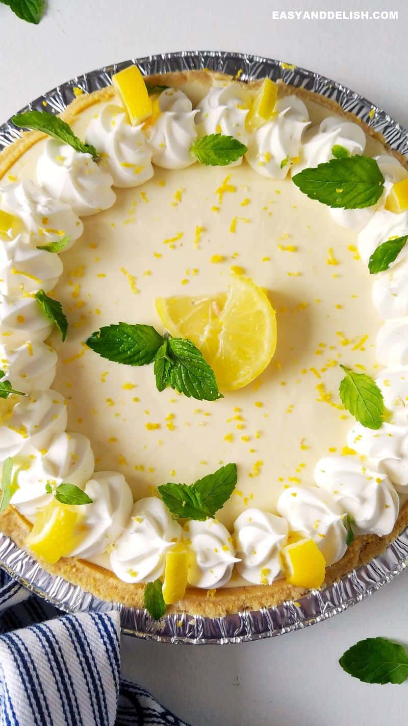 close up shot of whole lemon pie with condenssed milk