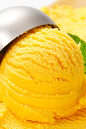 a scoop of mango ice cream