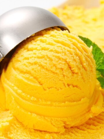 a scoop of mango ice cream