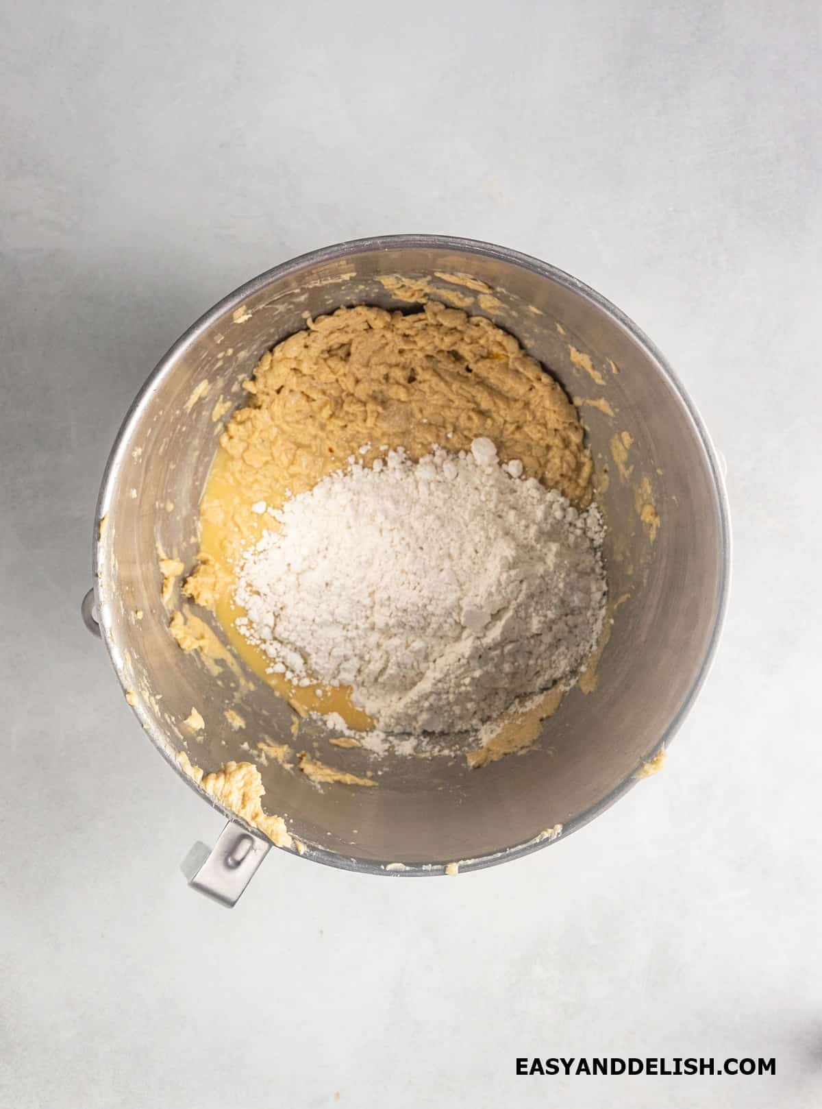 flour added to the batter in a bowl. 