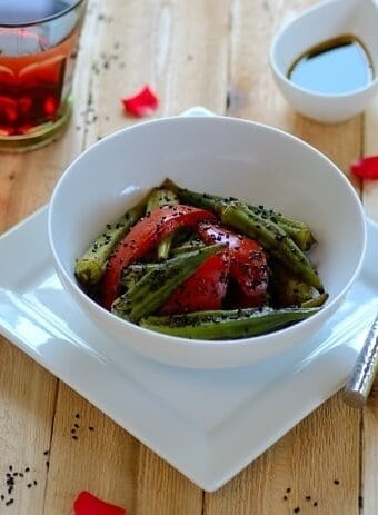 A bowl of okra salad on a table