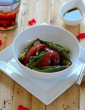 A bowl of okra salad on a table