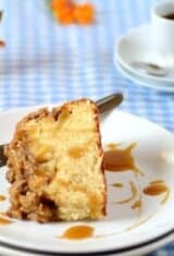 A slice of apple streusel cake in a plate