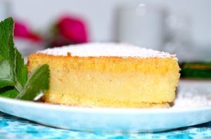 A close up of a piece of cornmeal cake on a plate