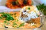 A close up of a rice being spooned