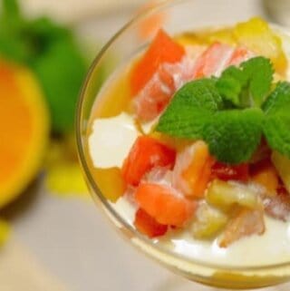 A bowl of fruit on a plate