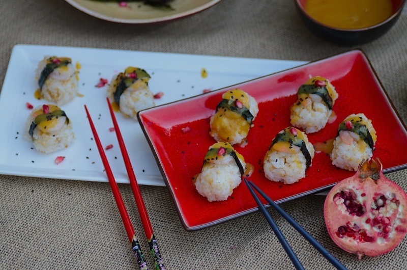 tropical sushi in a platter with chopsticks 