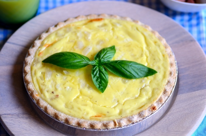 close up of a plate with quiche