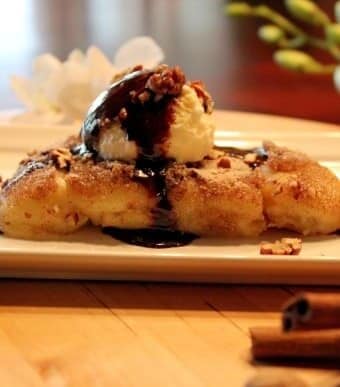 cartola recipe topped with ice cream and chocolate