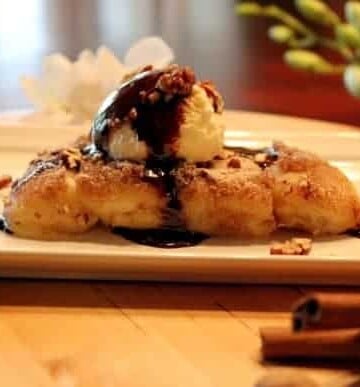 cartola recipe topped with ice cream and chocolate