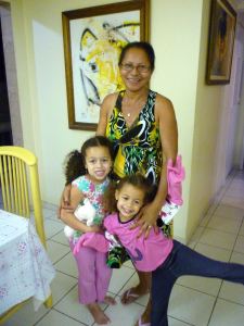 three peoplel posing for a picture
