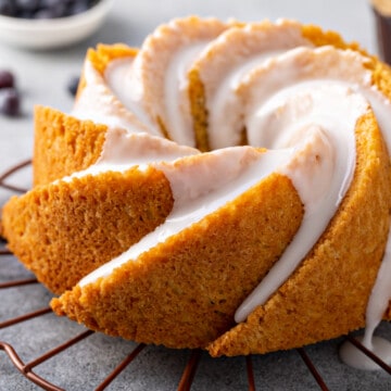 glazed passion fruit cake on a rack