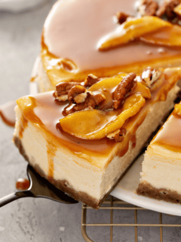 close up of a slice of low-carb caramel apple cheesecake.