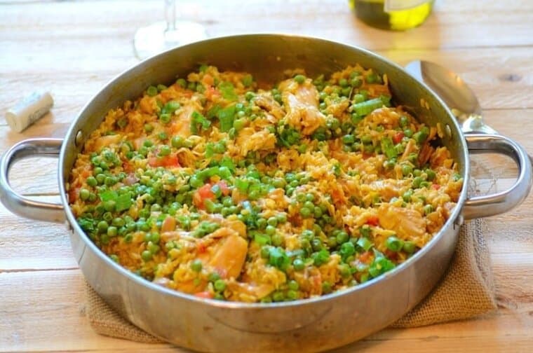 Brazilian saffron rice with chicken served in a pan