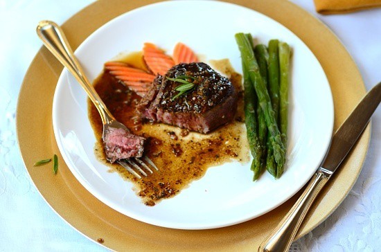 A plate with filet mignon partially sliced