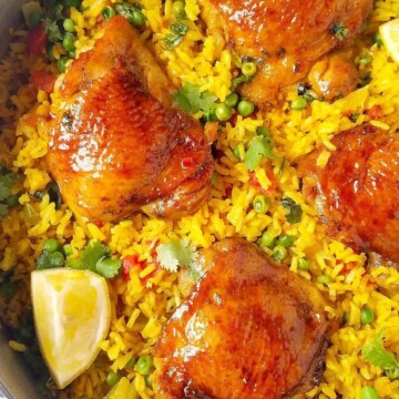 close up of galinhada mineira (Brazilian saffron rice with chicken) in a pan