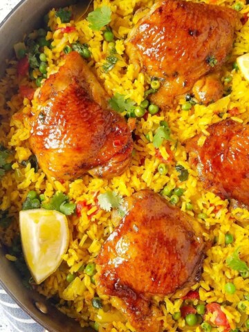 close up of galinhada mineira (Brazilian saffron rice with chicken) in a pan