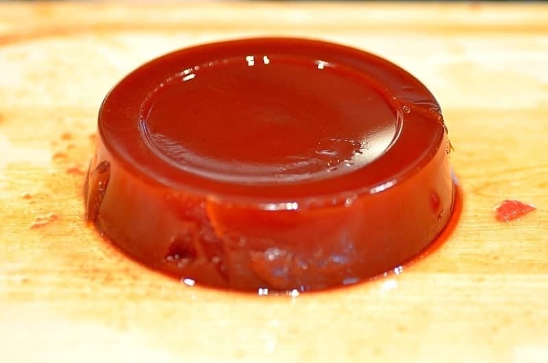 a ring of guava paste over a cutting board