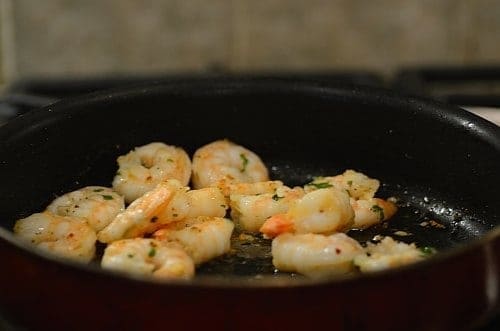 shrimp being cooked in a pan