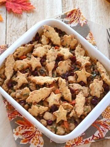 Turkey pot pie topped with crisp cranberry pecan pastry cutouts.