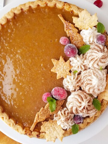 close up of southern sweet potato pie decorated for the holidays