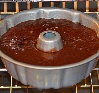 prune cake in a pan in the oven