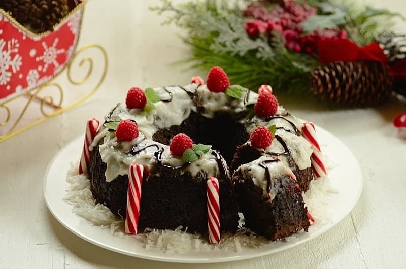 prune cake being sliced in a plate