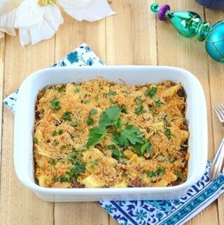 A breakfast casserole sitting on top of a wooden table