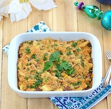 A breakfast casserole sitting on top of a wooden table