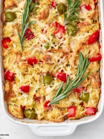 close up of savory bread pudding in a baking dish.