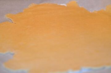 dough rolled out into a thin sheet