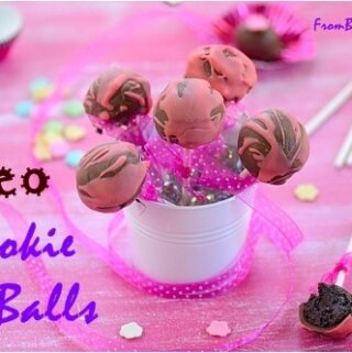 A small pail full of oreo cookie balls