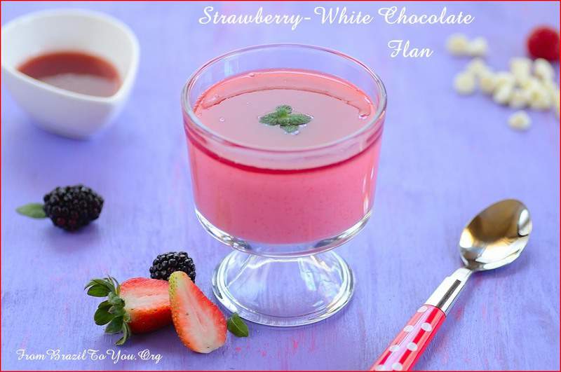 A glass bowl of strawberry gelatin flan