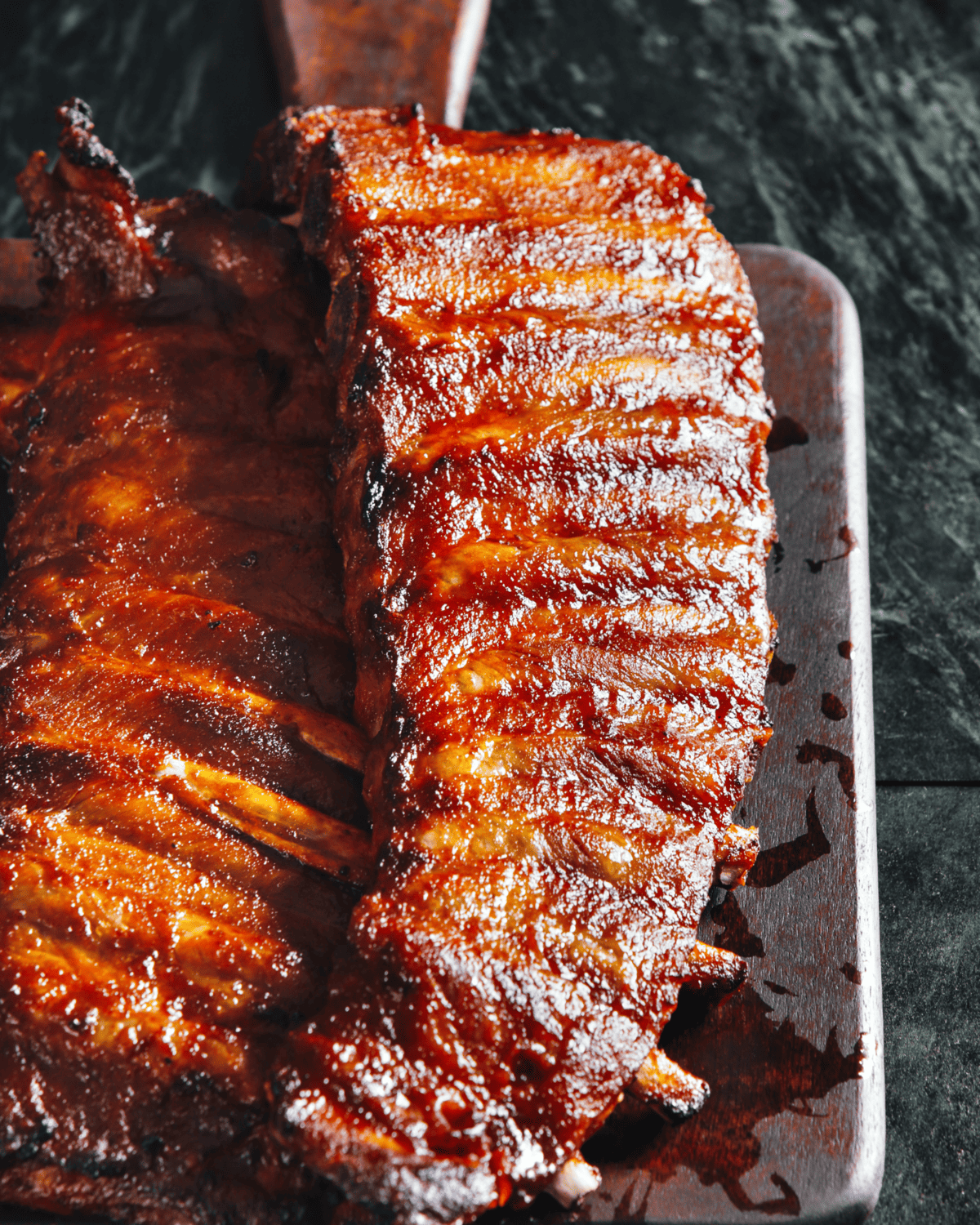 oven baked pork ribs brushed with honey and broiled in a baking sheet.