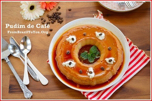 ring of coffee flan on a white plate with dollops of whipped cream on top