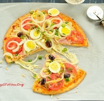 pizza a portuguesa with sliced boiled egg topping